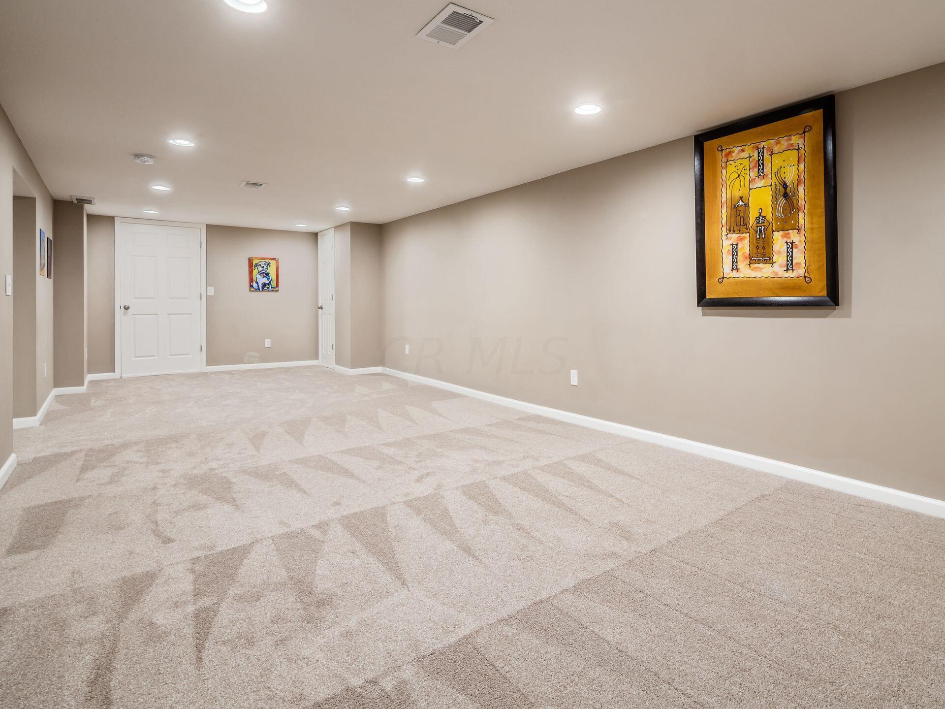 2711 Folkstone Road Columbus, OH 43220 - Photo 49 of 62 Room 3 31'7"x11'9" Plush carpet, recessed lighting