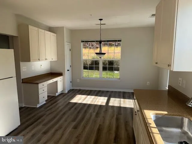 a bathroom with a bathtub a toilet and a shower