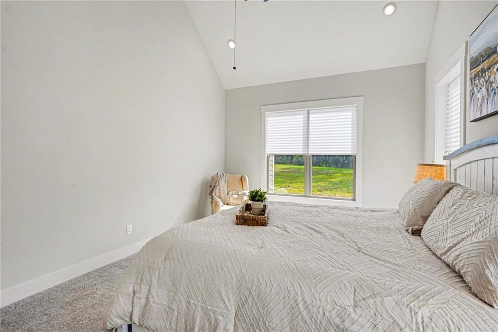 287 Conner Lane Williamson, GA 30292 - Photo 19 of 33 a bedroom with a bed and a window