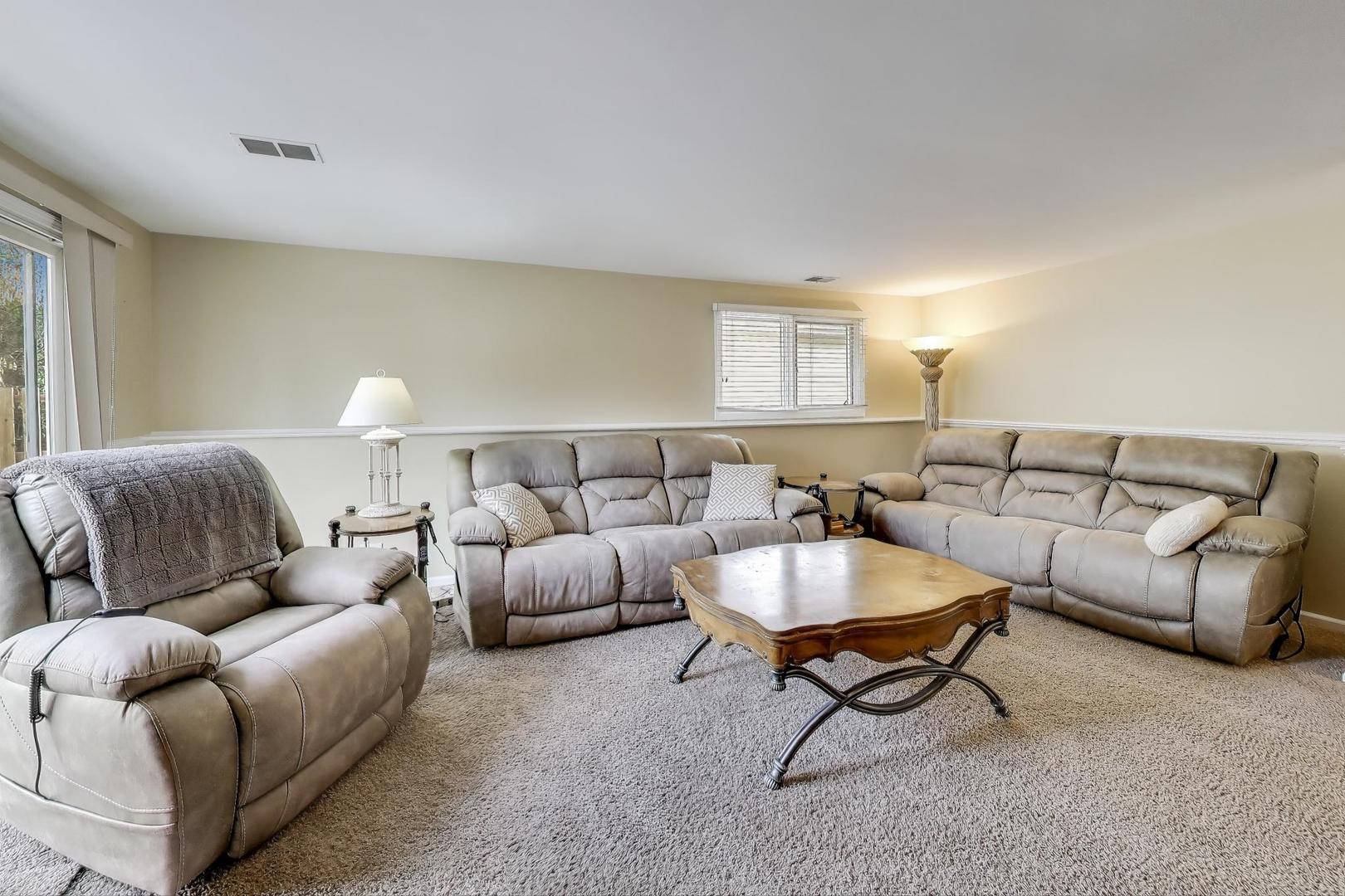 1407 Wilson Avenue Wheaton, IL 60189 - Photo 20 of 31 a living room with furniture and a couch