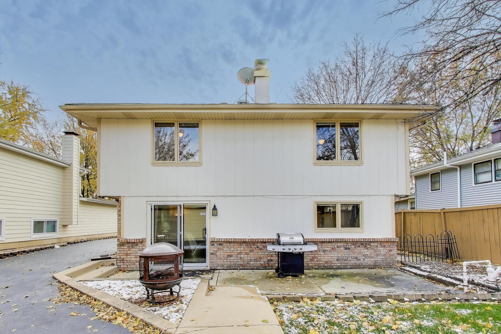 1407 Wilson Avenue Wheaton, IL 60189 - Photo 27 of 31 a front view of a house with sitting area