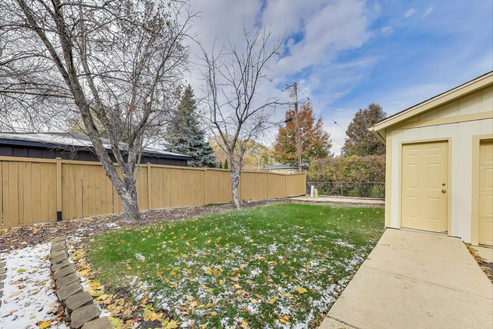 1407 Wilson Avenue Wheaton, IL 60189 - Photo 29 of 31 a front view of house with yard and trees