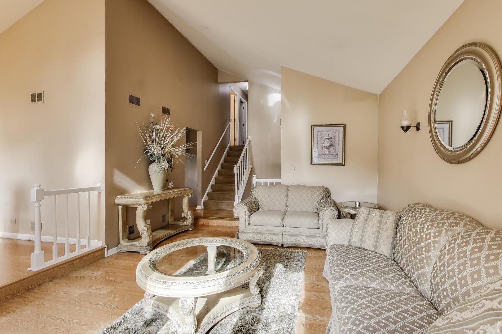 1407 Wilson Avenue Wheaton, IL 60189 - Photo 3 of 31 a living room with furniture and a wooden floor