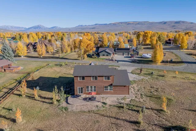 a view of a ocean with a mountain