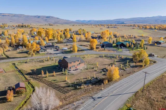 an aerial view of residential house with outdoor space
