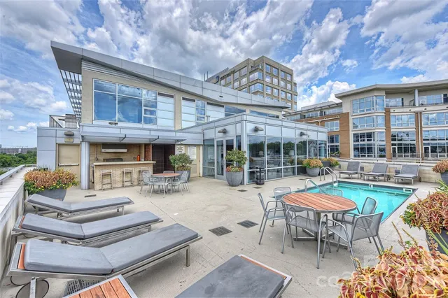 a view of a patio with couches table and chairs