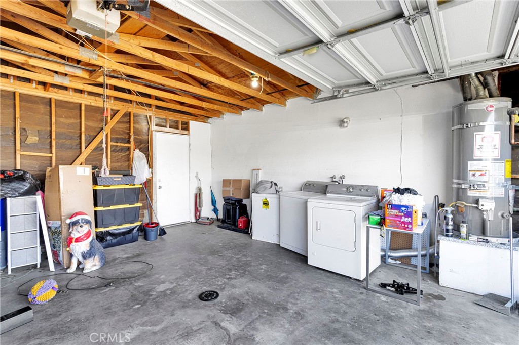 18350 Jonathan Street Adelanto, CA 92301 - Photo 23 of 32 a utility room with dryer and washer