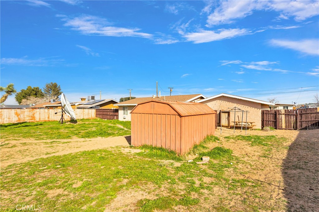 18350 Jonathan Street Adelanto, CA 92301 - Photo 28 of 32 a view of a large garden with an outdoor space