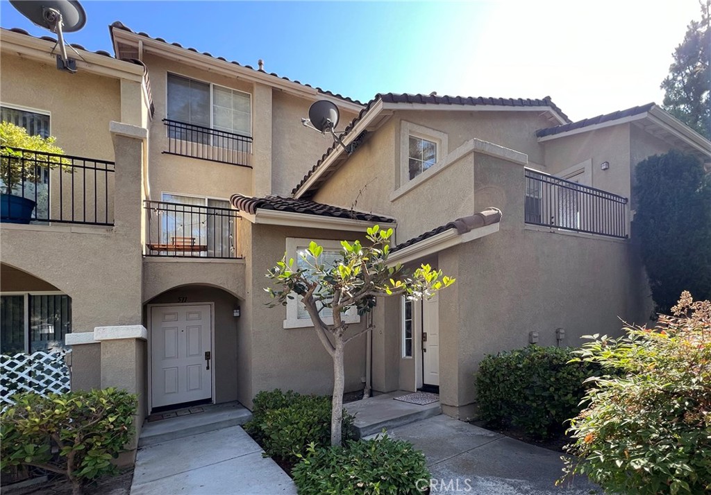 512 Birch Grove Irvine, CA 92618 - Photo 5 of 20 a front view of a house with plants