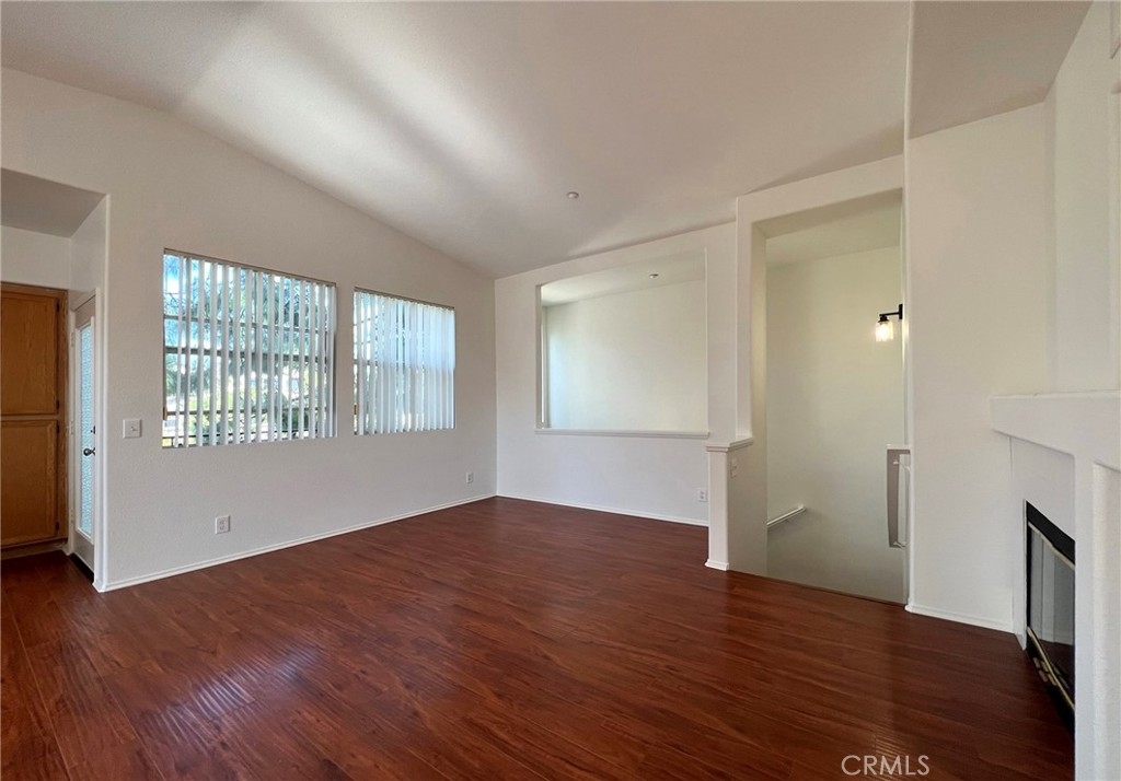 512 Birch Grove Irvine, CA 92618 - Photo 10 of 20 an empty room with wooden floor and windows