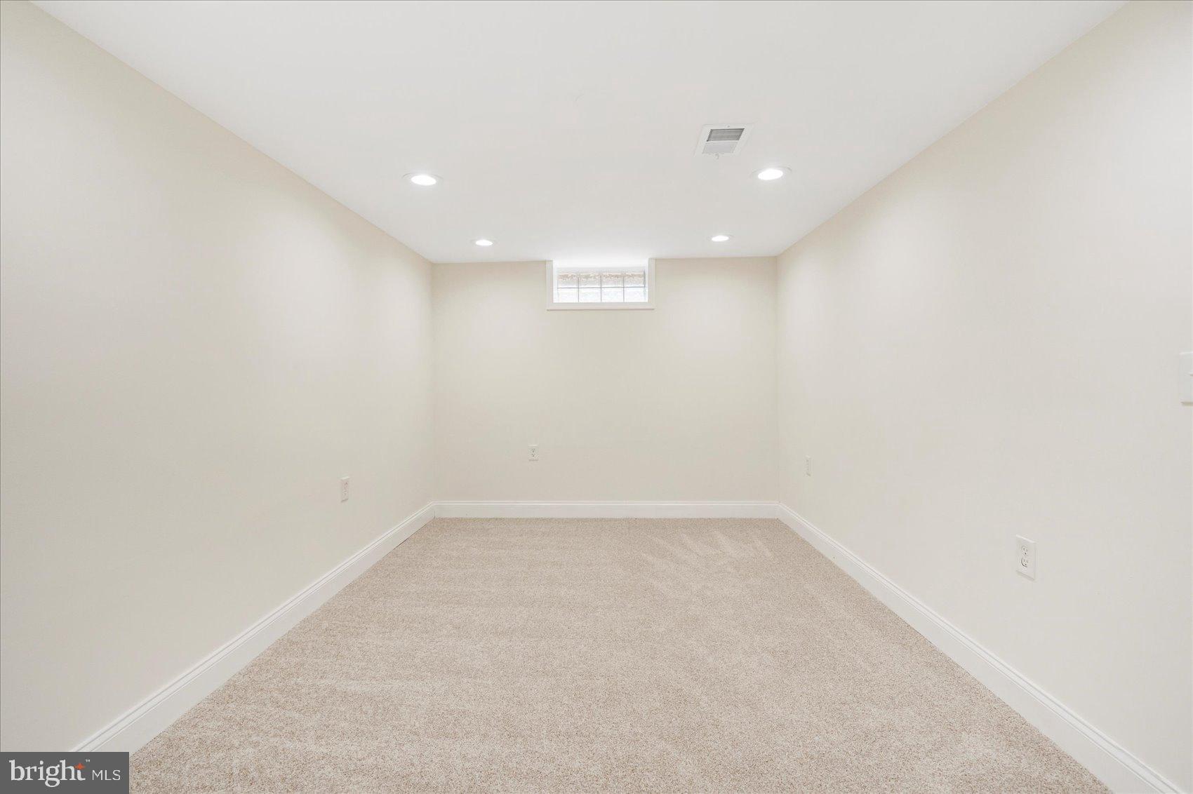 6726 Longhill Road Baltimore, MD 21207 - Photo 22 of 36 a view of an empty room