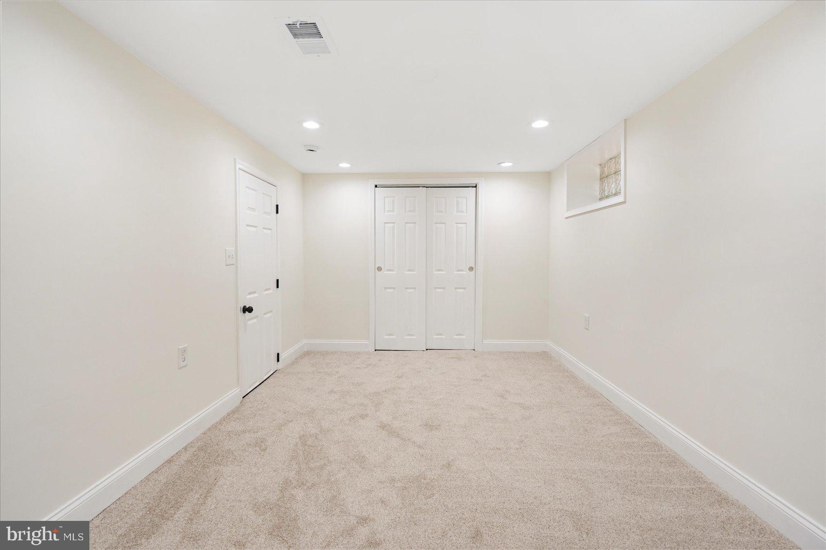 6726 Longhill Road Baltimore, MD 21207 - Photo 23 of 36 a view of an empty room