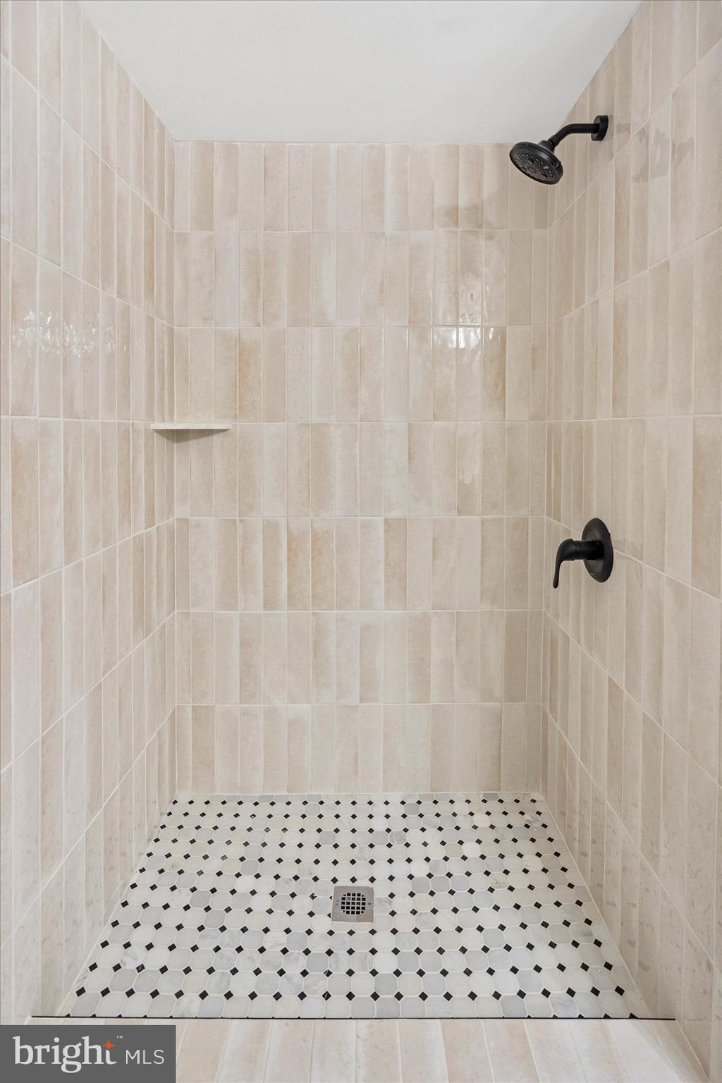 6726 Longhill Road Baltimore, MD 21207 - Photo 25 of 36 a bathroom with a shower