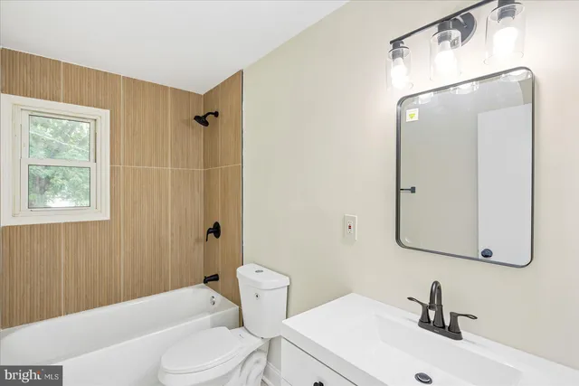 a view of a hallway with chairs