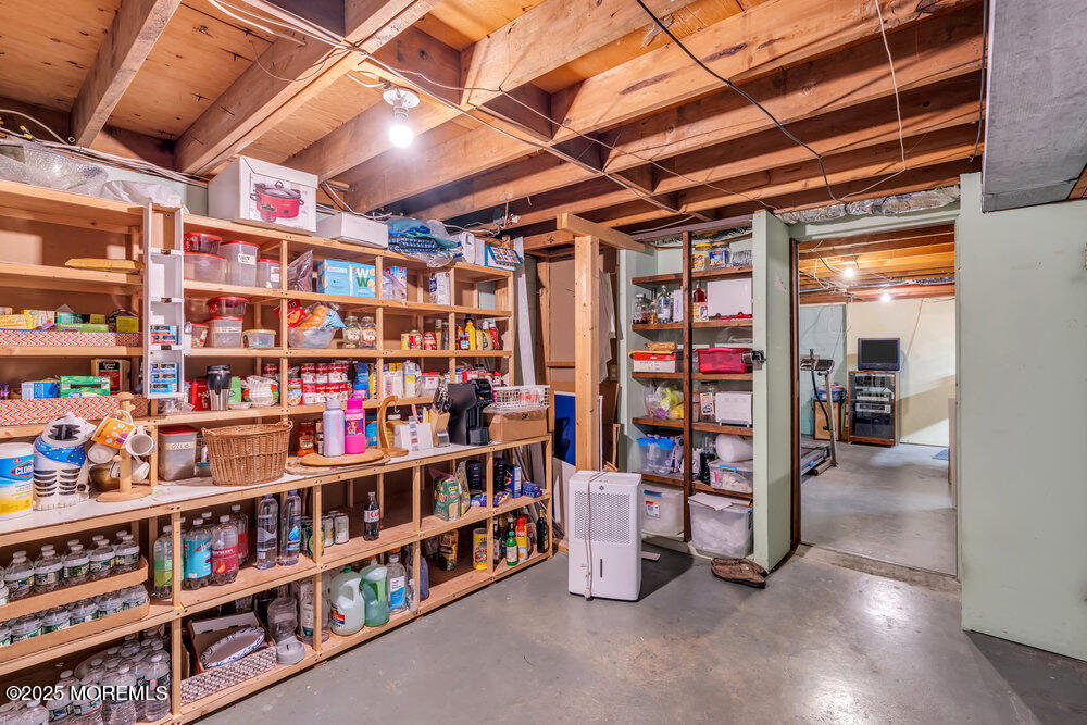 64 Sunset Drive Howell, NJ 07731 - Photo 19 of 24 a view of store room with racks
