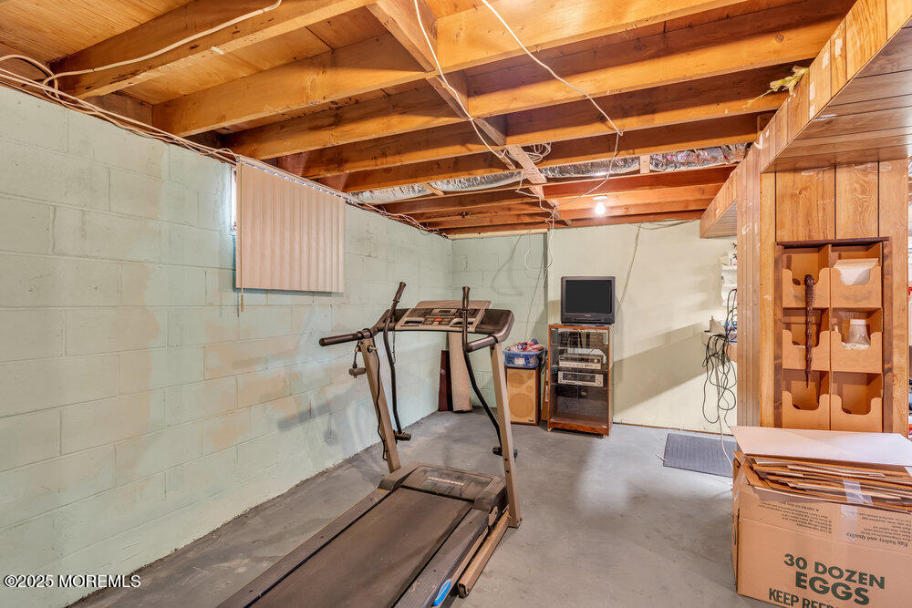 64 Sunset Drive Howell, NJ 07731 - Photo 20 of 24 a view of a room with gym equipment