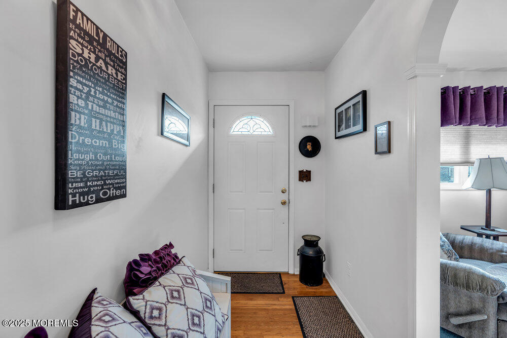 64 Sunset Drive Howell, NJ 07731 - Photo 4 of 24 a view of livingroom with furniture and closet