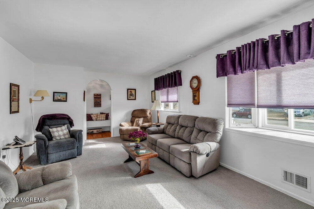 64 Sunset Drive Howell, NJ 07731 - Photo 5 of 24 a living room with furniture