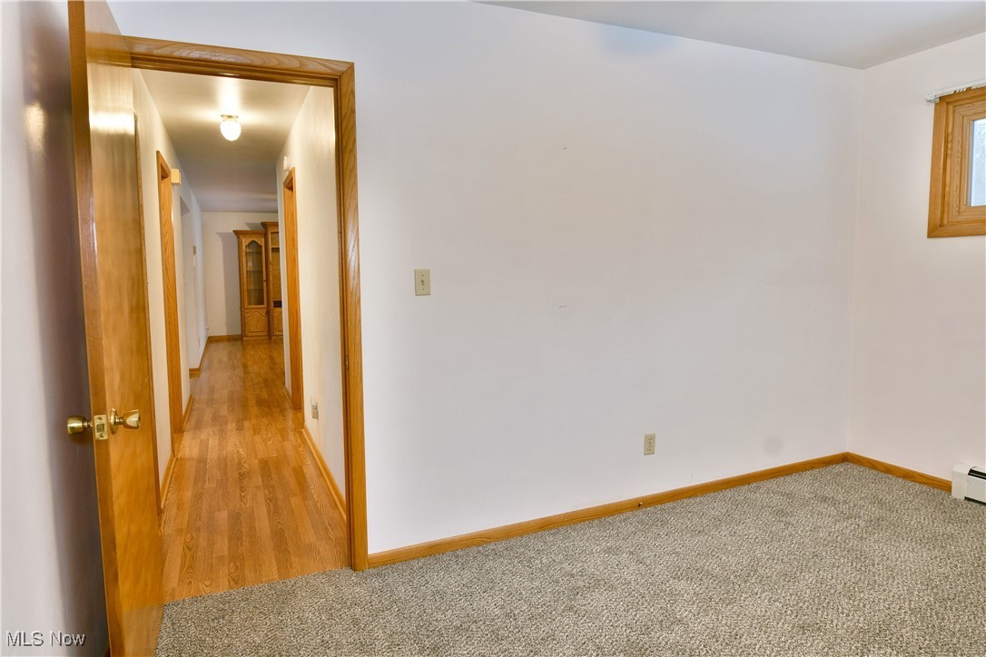7155 Drake State Line Road Burghill, OH 44404 - Photo 36 of 50 Carpeted empty room featuring baseboards