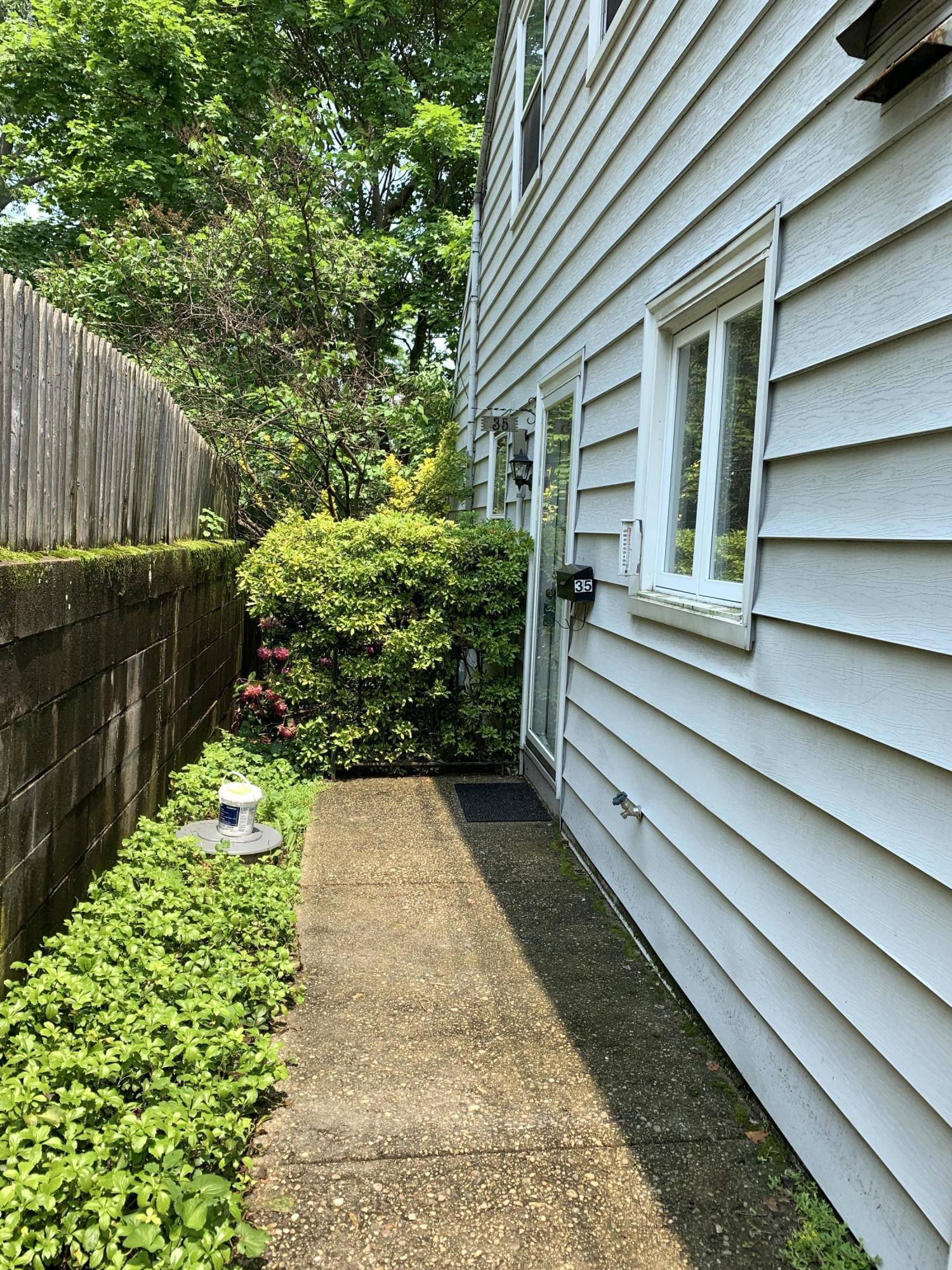 35 Sound View Drive Greenwich, CT 06830 - Photo 2 of 11 a view of small garden with statue