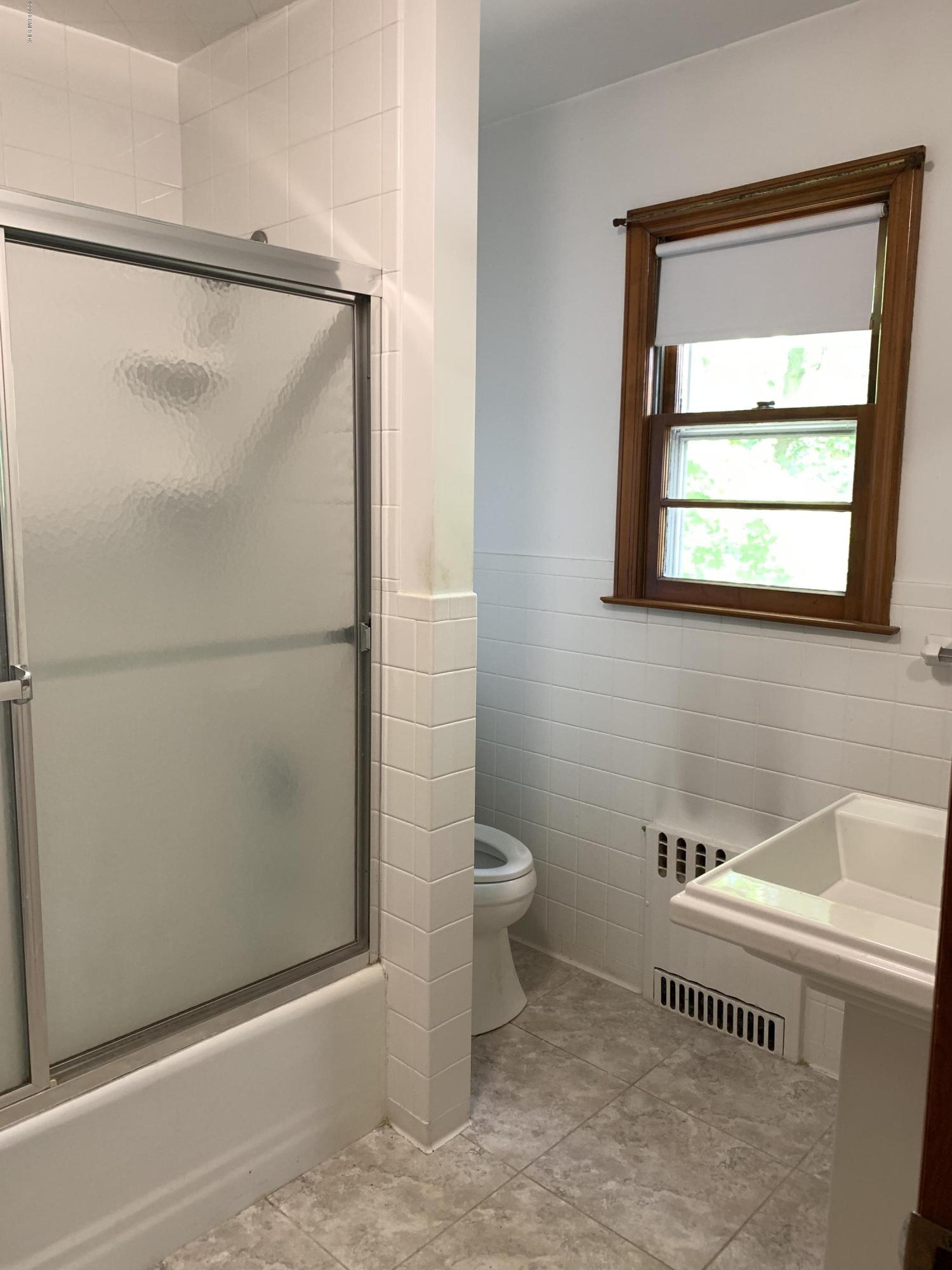 35 Sound View Drive Greenwich, CT 06830 - Photo 10 of 11 a bathroom with a shower and a toilet