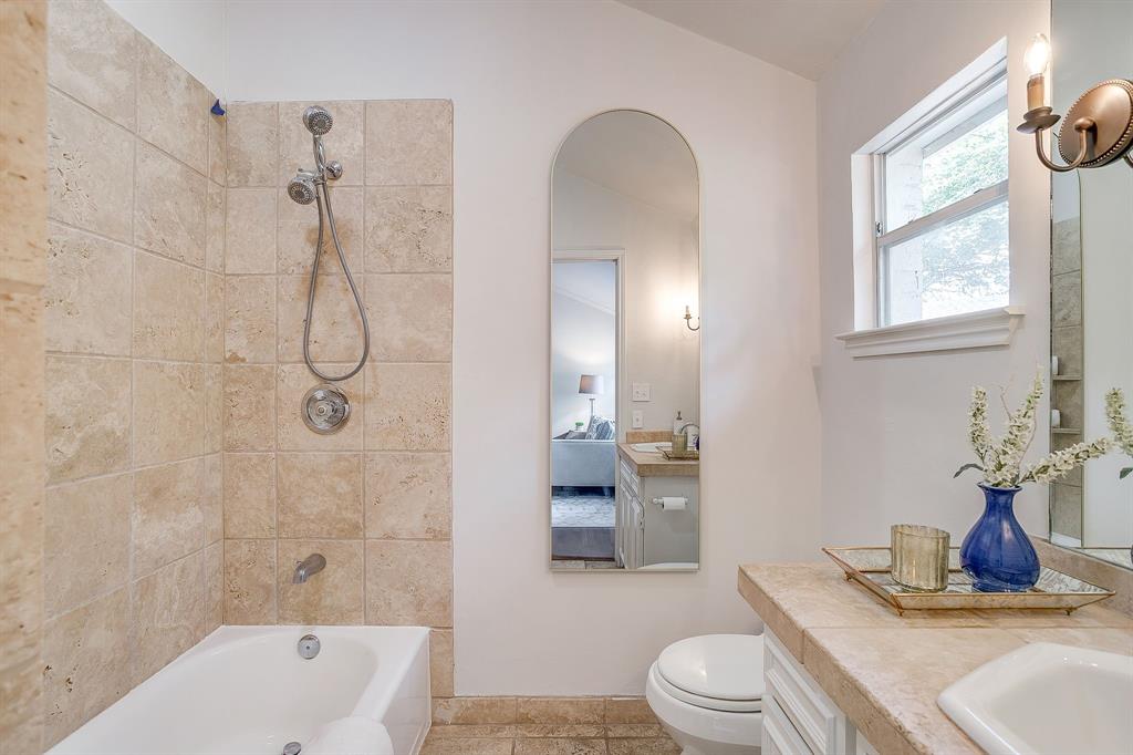 624 Edgefield Road Fort Worth, TX 76107 - Photo 34 of 37 a bathroom with a sink a toilet and shower
