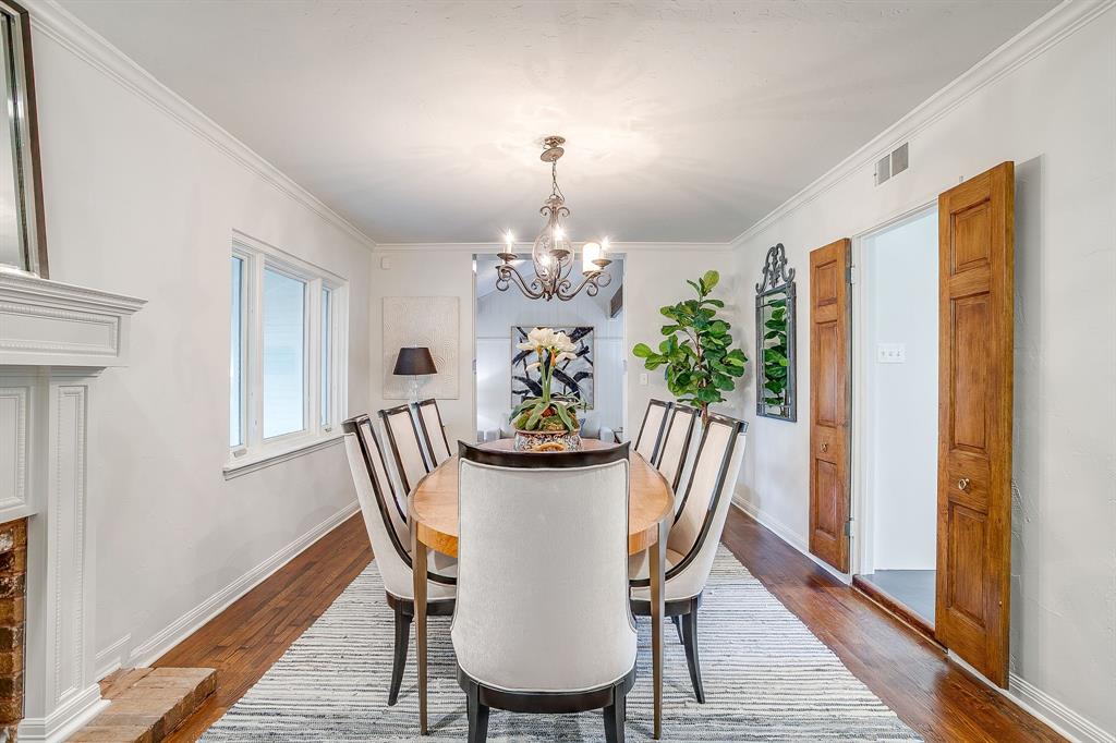 624 Edgefield Road Fort Worth, TX 76107 - Photo 8 of 37 a view of a dining room with furniture window and wooden floor