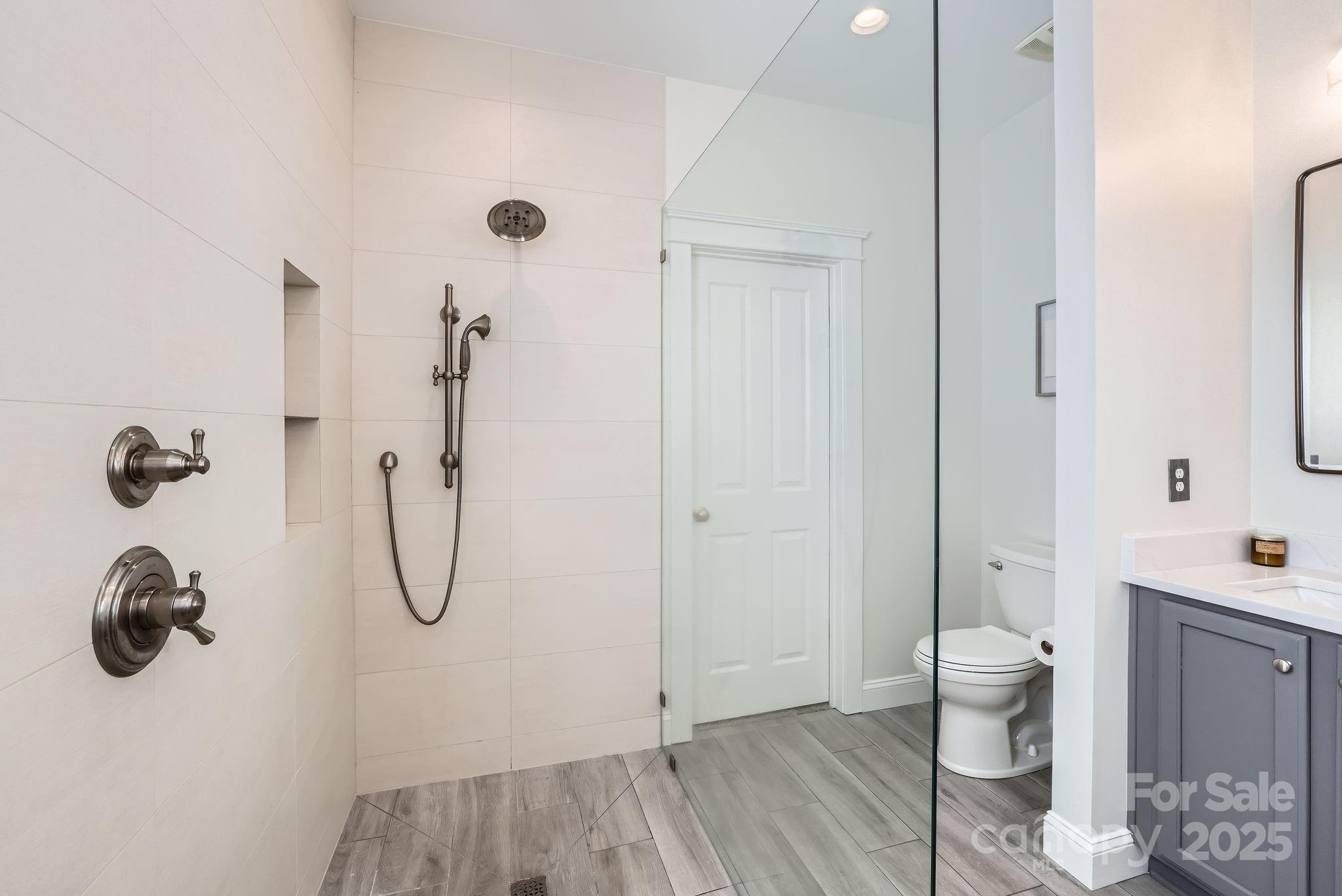 275 Bridges Farm Road Mooresville, NC 28115 - Photo 23 of 48 a bathroom with a shower