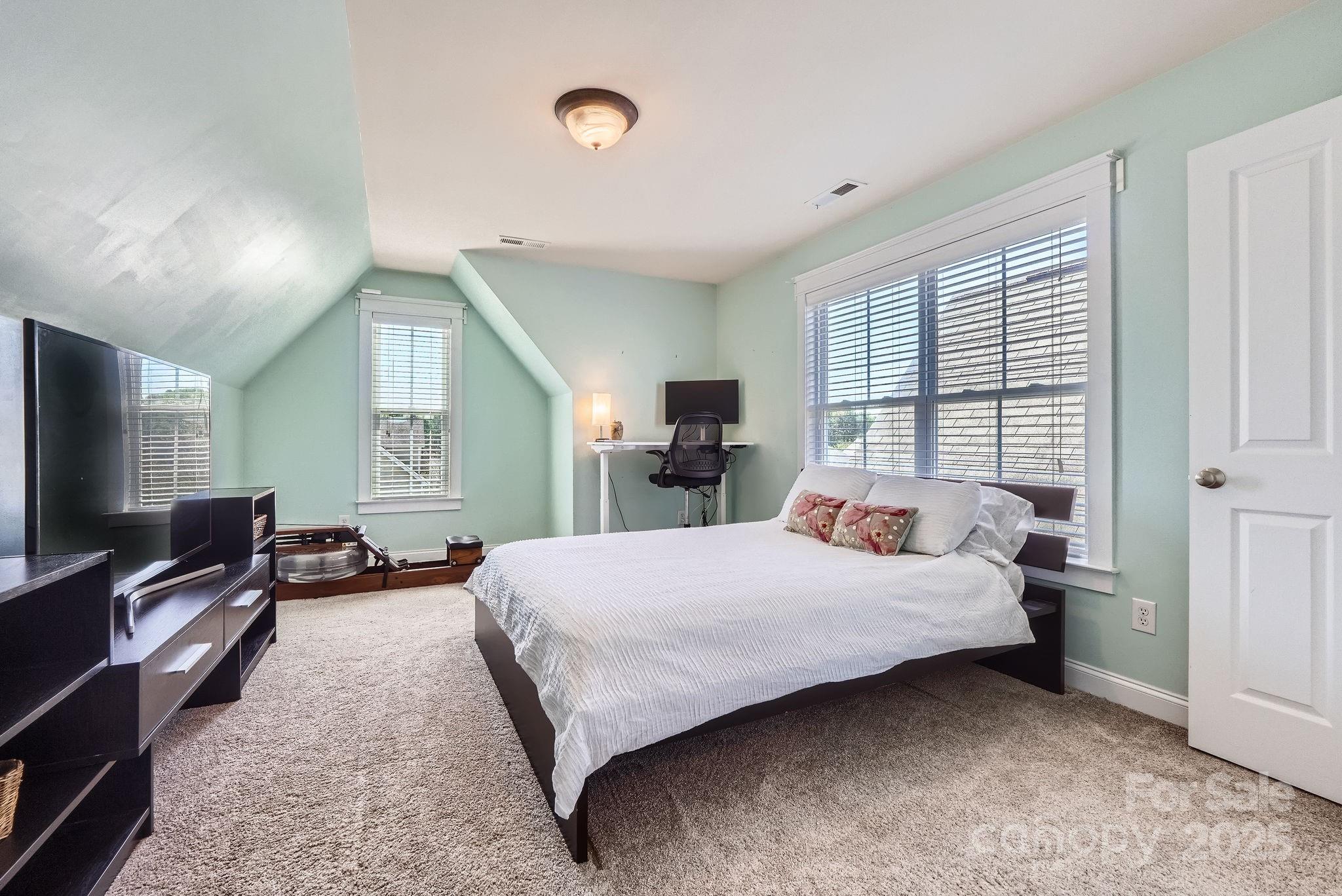 275 Bridges Farm Road Mooresville, NC 28115 - Photo 27 of 48 a bedroom with a bed and furniture