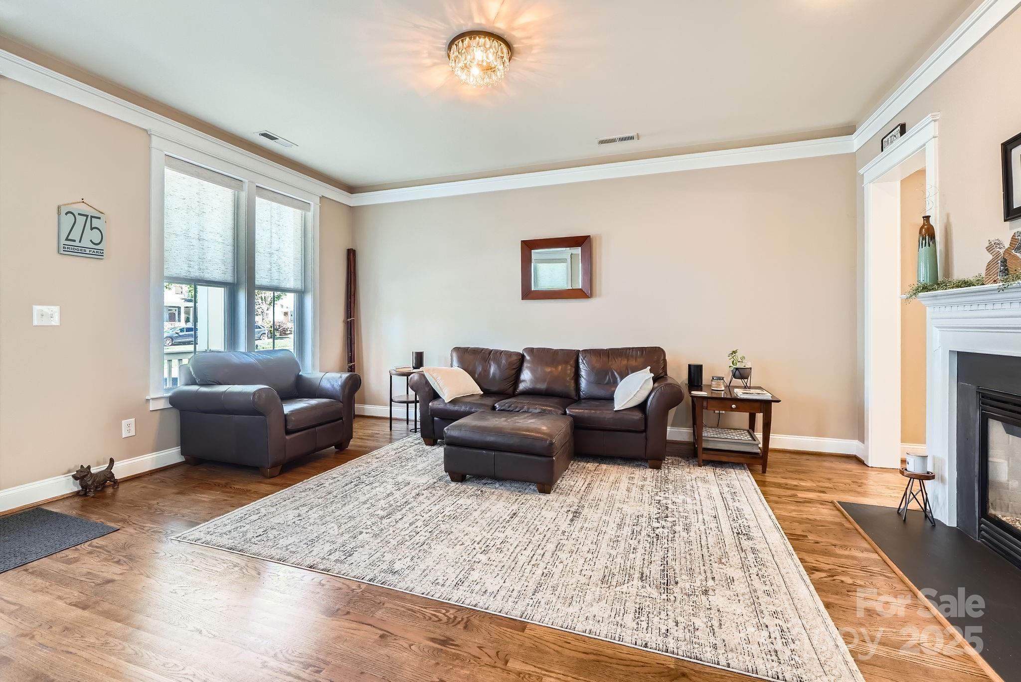 275 Bridges Farm Road Mooresville, NC 28115 - Photo 9 of 48 a living room with furniture and a couch