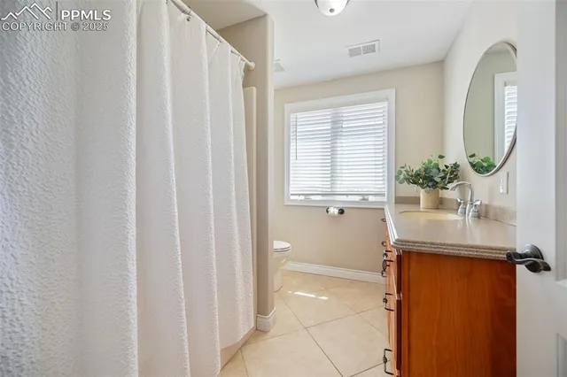 a view of a livingroom with furniture and a garage