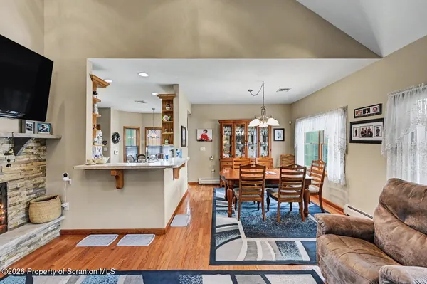 a kitchen with a sink appliances and cabinets