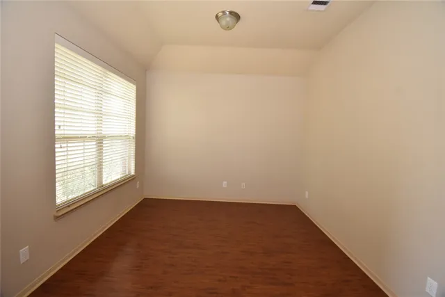 an empty room with a window