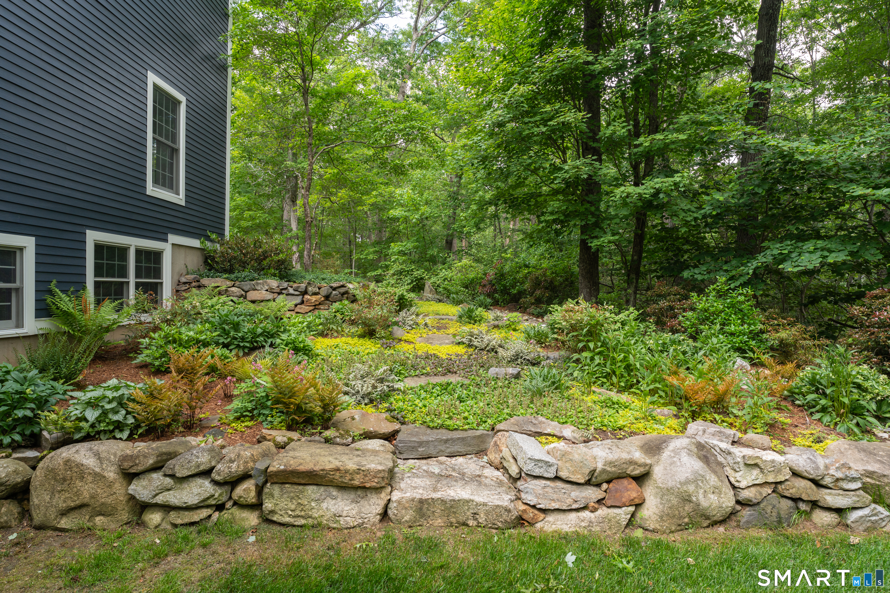 46 Laurel Cliffs Road Guilford, CT 06437 - Photo 30 of 40 The whole yard is landscaped. the east side yard is especially dear.