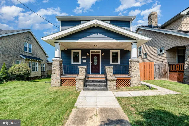 a front view of a house with a porch