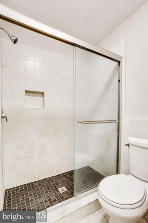 a view of a porch with wooden floor