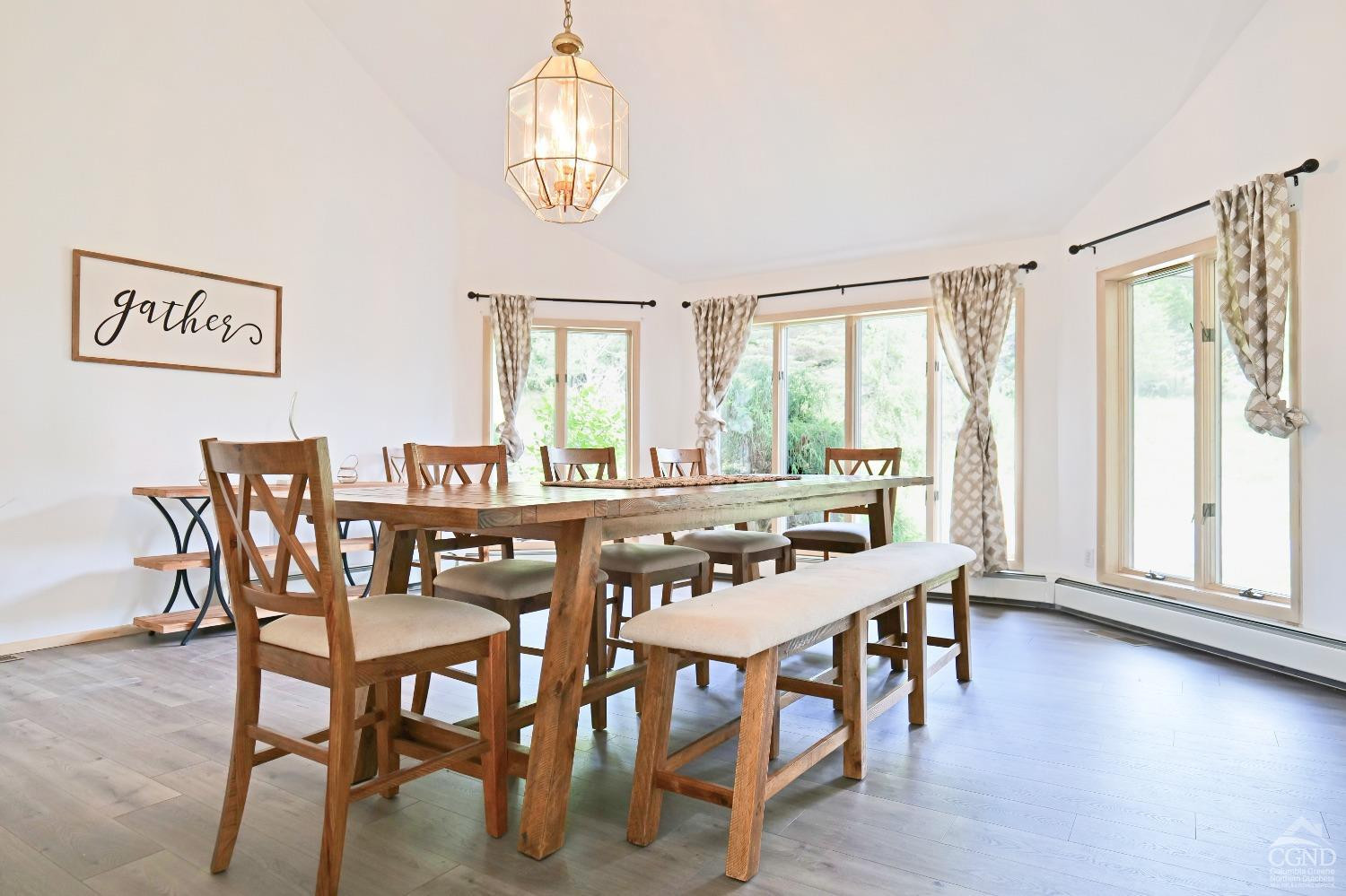 3372 County Road 10 Windham, NY 12496 - Photo 13 of 37 a view of a dining room with furniture window and wooden floor