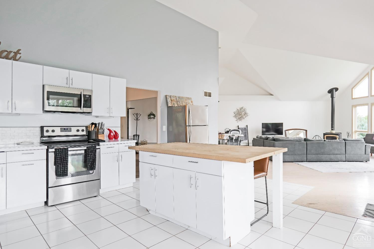 3372 County Road 10 Windham, NY 12496 - Photo 17 of 37 a kitchen with granite countertop cabinets and steel stainless steel appliances