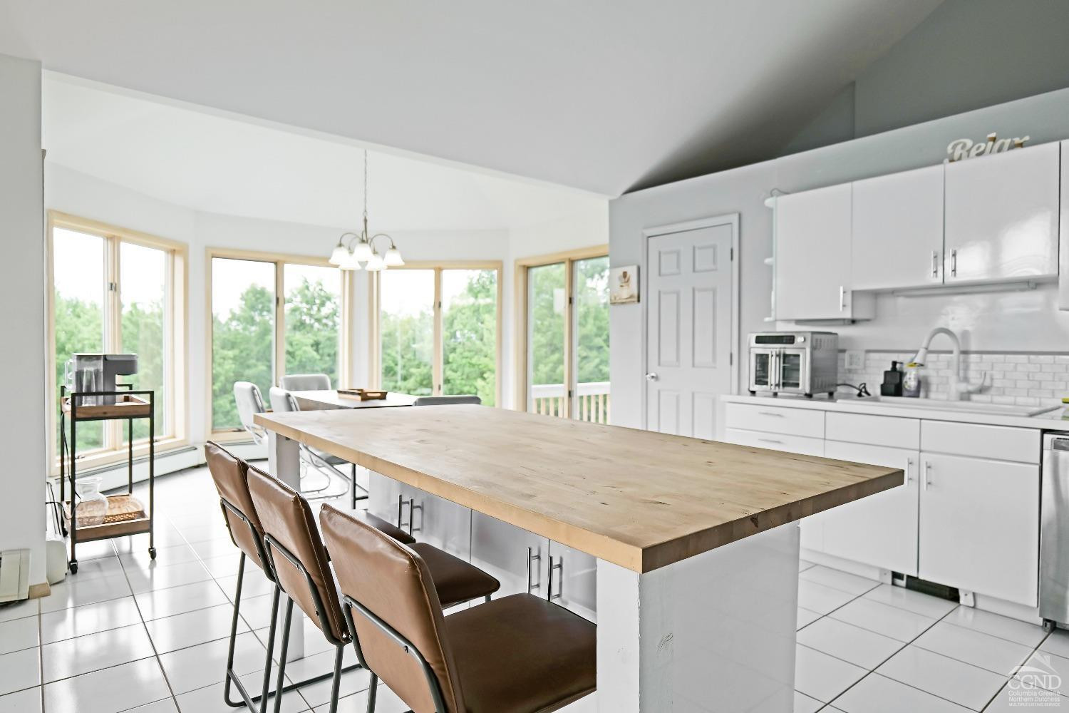 3372 County Road 10 Windham, NY 12496 - Photo 20 of 37 a kitchen that has a cabinets counter space and a stove