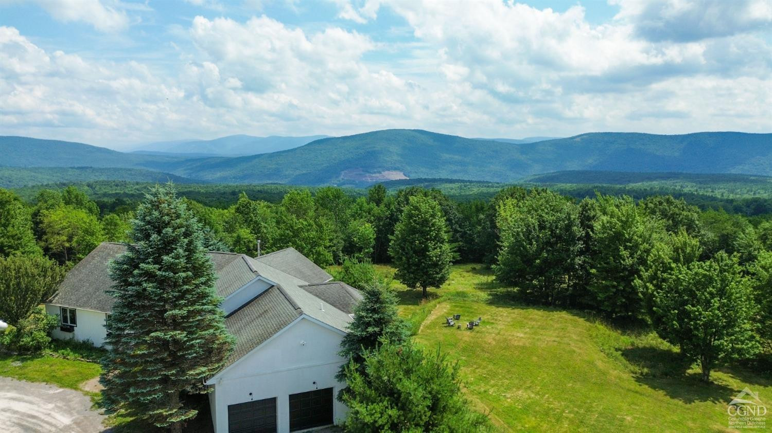 3372 County Road 10 Windham, NY 12496 - Photo 2 of 37 an aerial view of residential house with outdoor space and mountain view in back