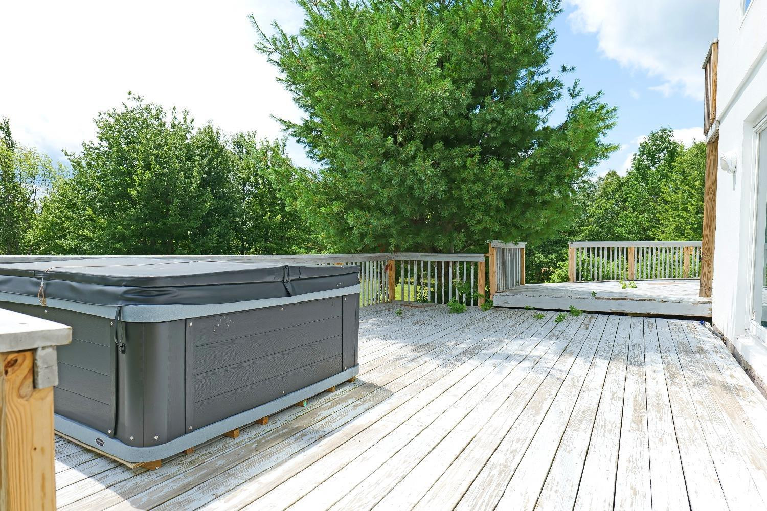 3372 County Road 10 Windham, NY 12496 - Photo 10 of 37 a view of backyard with a deck and wooden floor