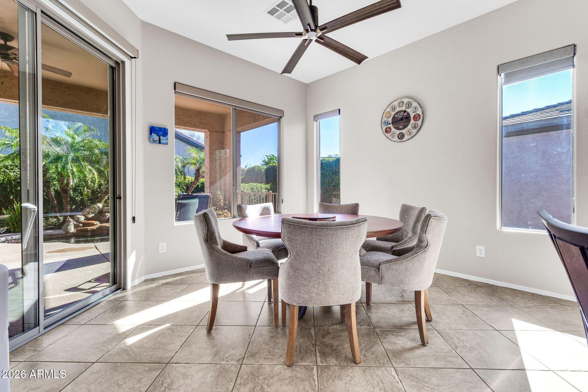 5333 South Marigold Way Gilbert, AZ 85298 - Photo 13 of 69 a view of a dining room with furniture window and outside view