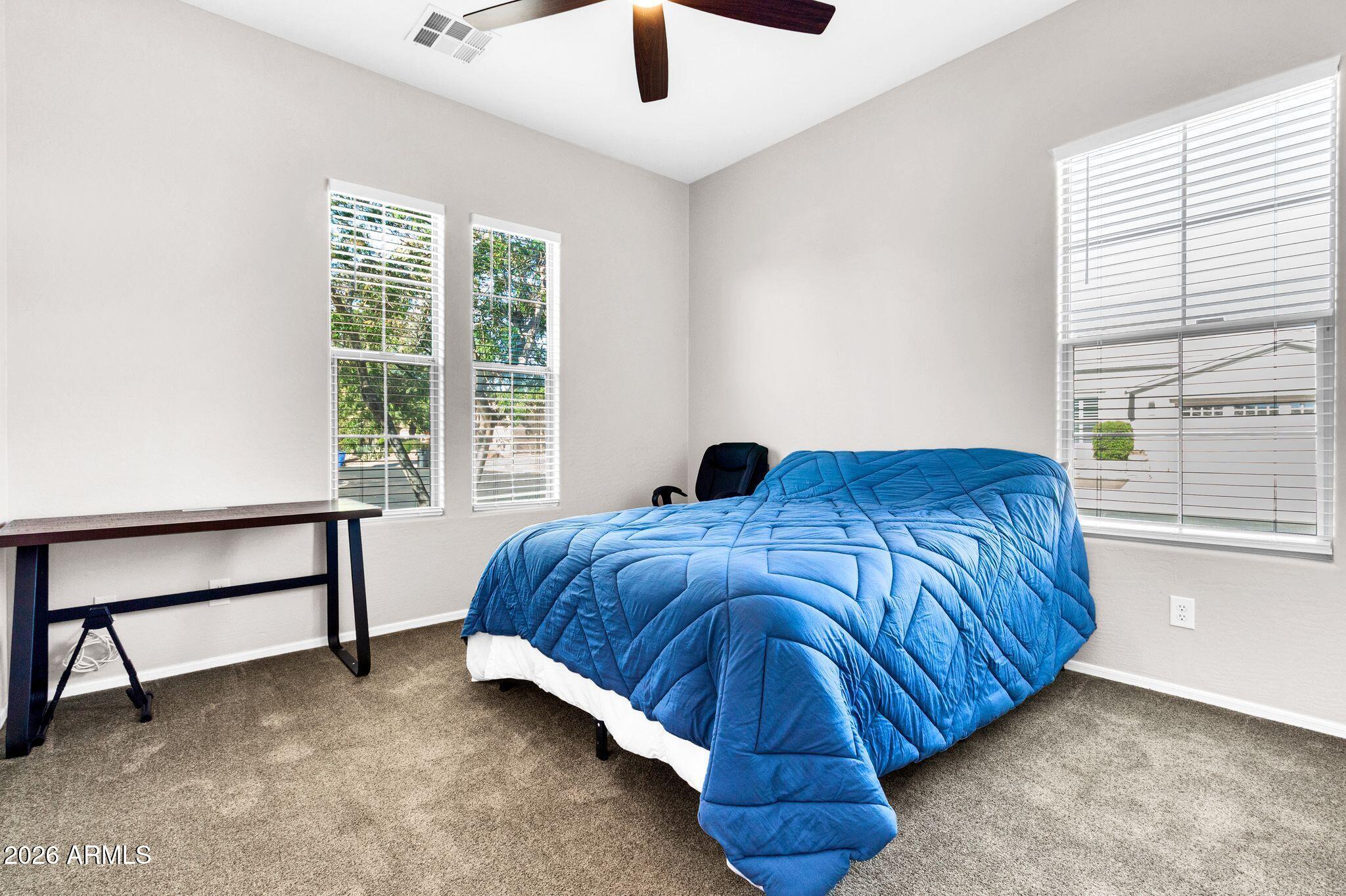 5333 South Marigold Way Gilbert, AZ 85298 - Photo 23 of 69 a bedroom with a bed and window