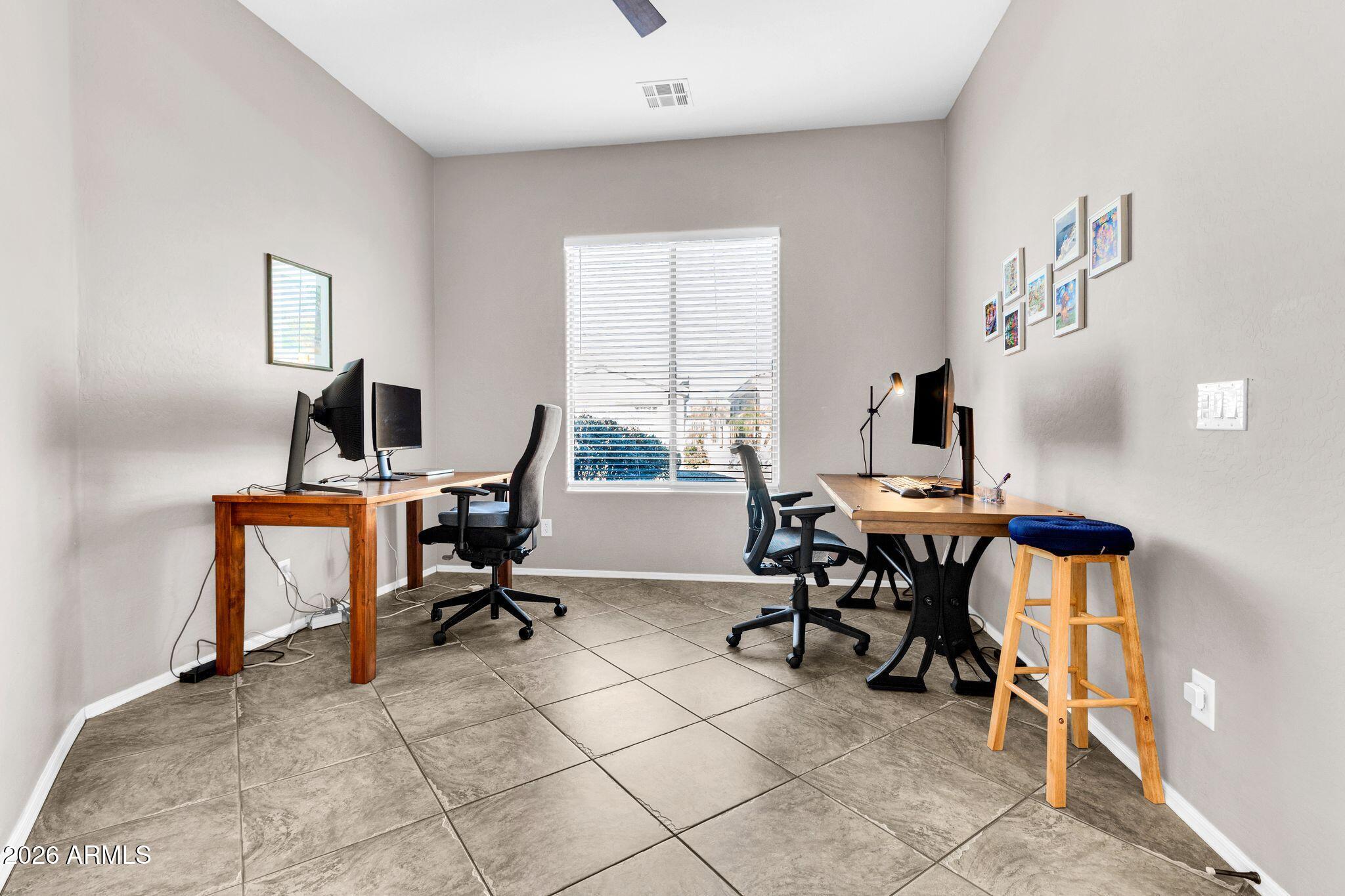 5333 South Marigold Way Gilbert, AZ 85298 - Photo 28 of 69 a view of a workspace with furniture and a window