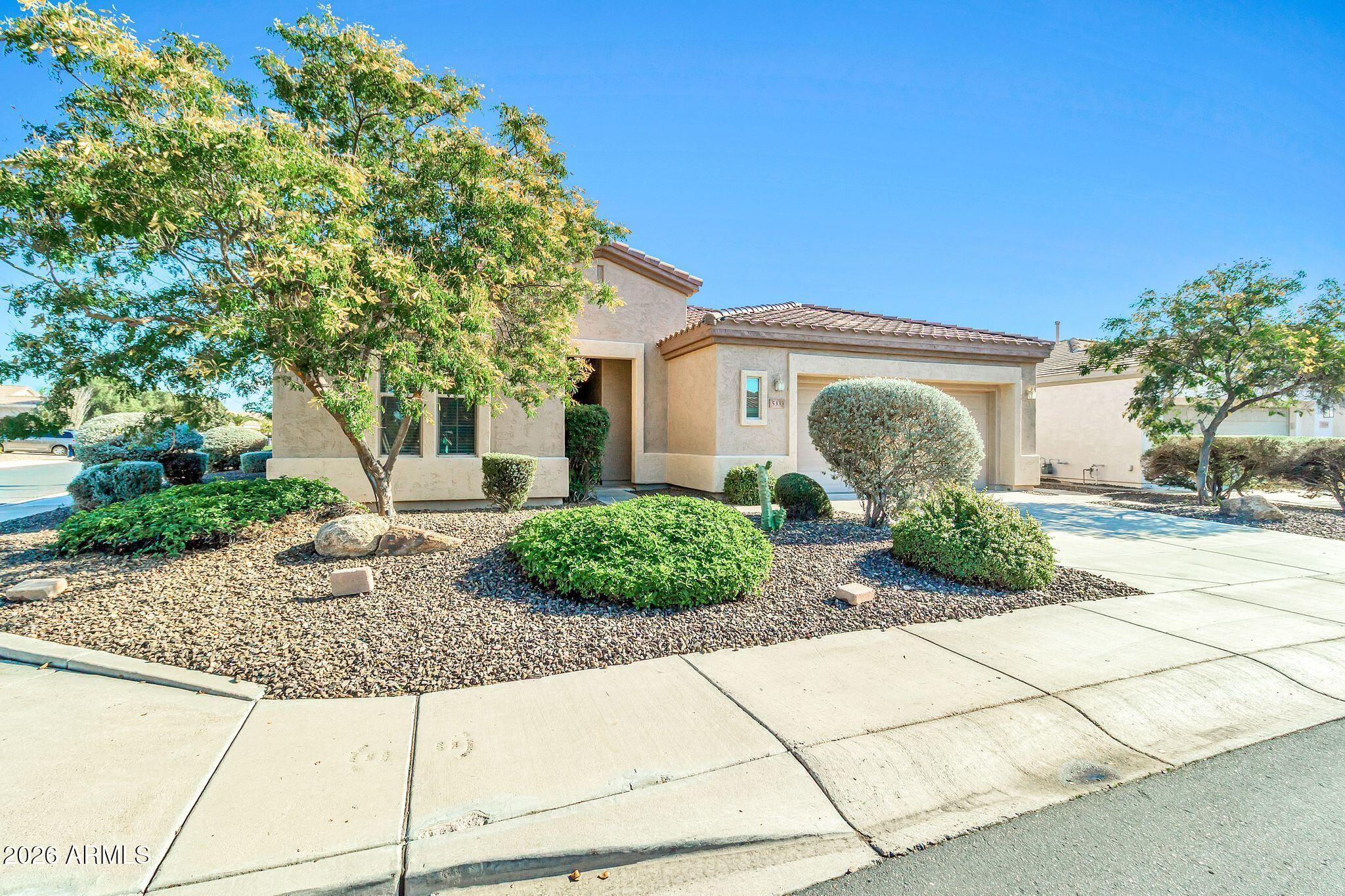 5333 South Marigold Way Gilbert, AZ 85298 - Photo 31 of 69 a front view of a house with garden