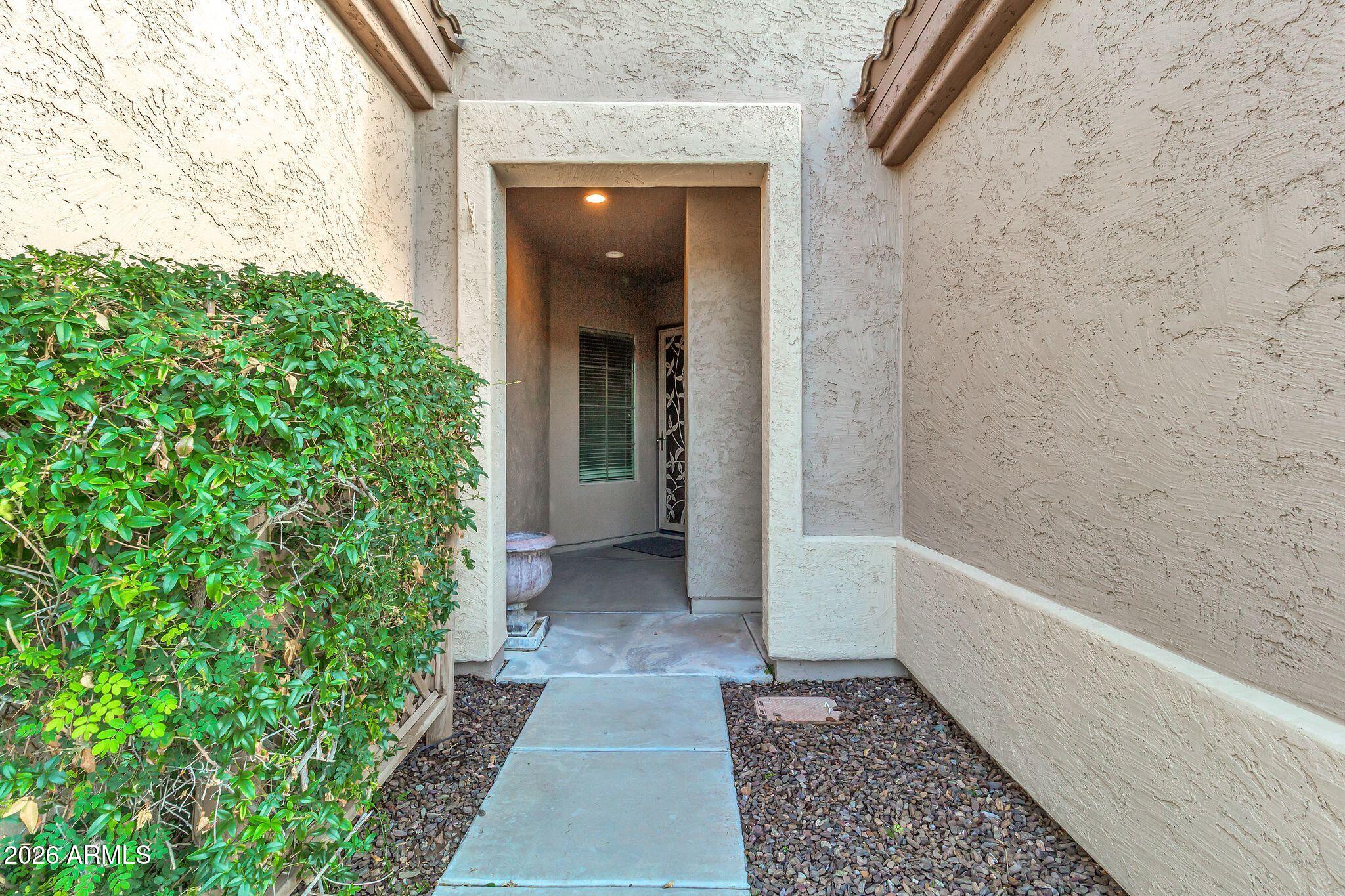 5333 South Marigold Way Gilbert, AZ 85298 - Photo 32 of 69 a view of a pathway both side of a house