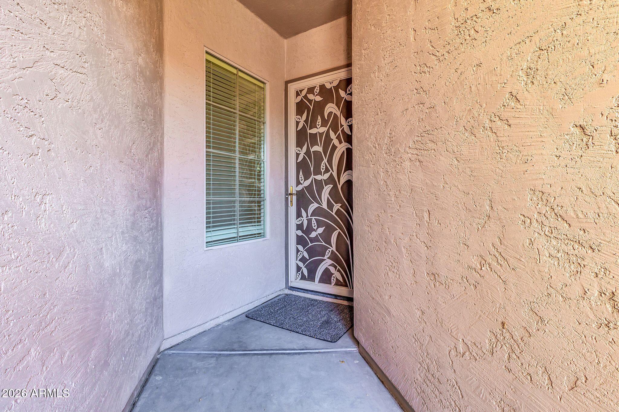 5333 South Marigold Way Gilbert, AZ 85298 - Photo 33 of 69 a bathroom with a window and a shower