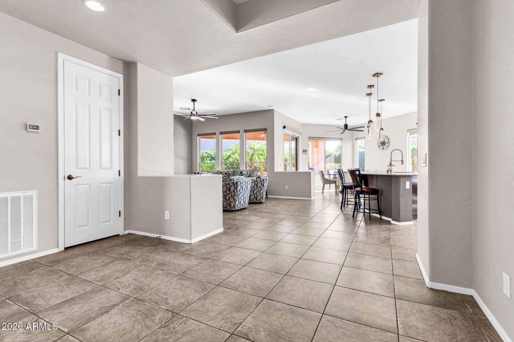 5333 South Marigold Way Gilbert, AZ 85298 - Photo 3 of 69 a view of kitchen with furniture and dining table