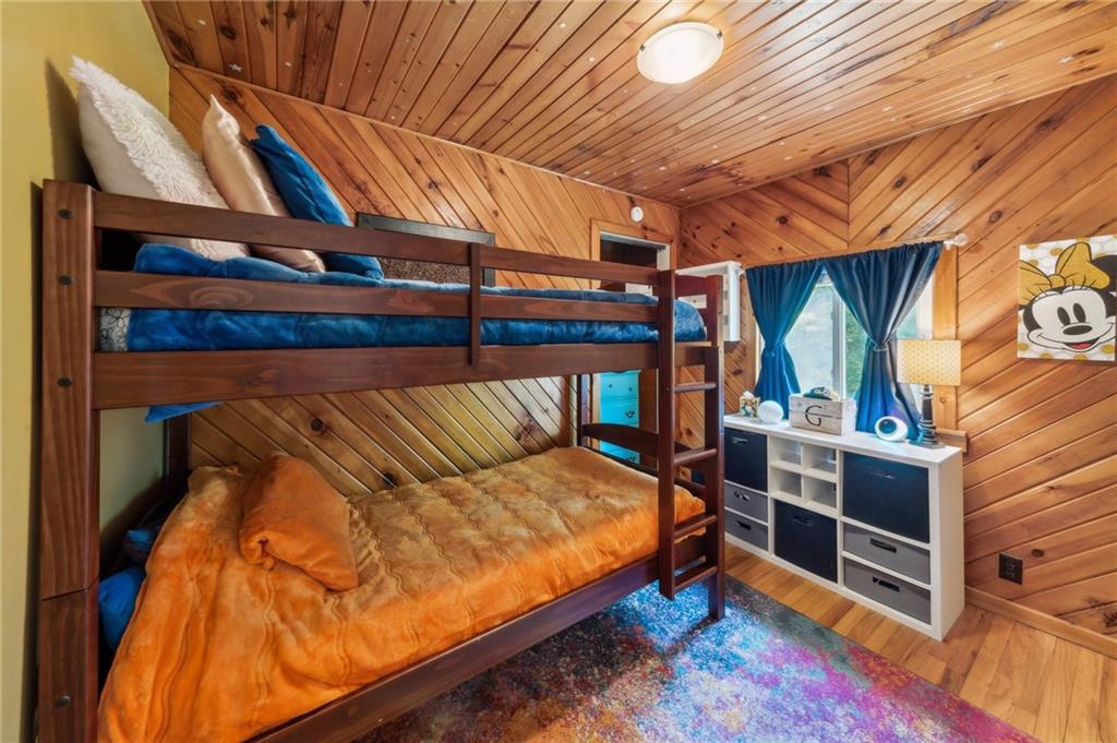 401 Finley Road Pittsburgh, PA 15239 - Photo 21 of 35 a bedroom with a bed and a walk in closet