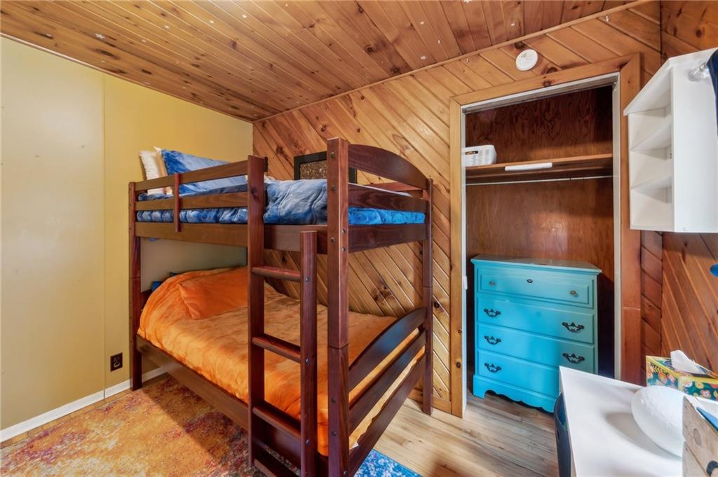 401 Finley Road Pittsburgh, PA 15239 - Photo 22 of 35 a bedroom with a bunk bed and a dresser